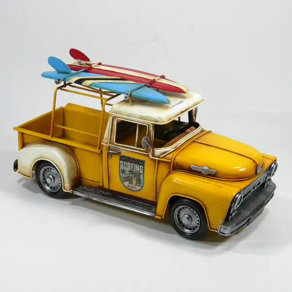 Yellow Ute with Surfboards