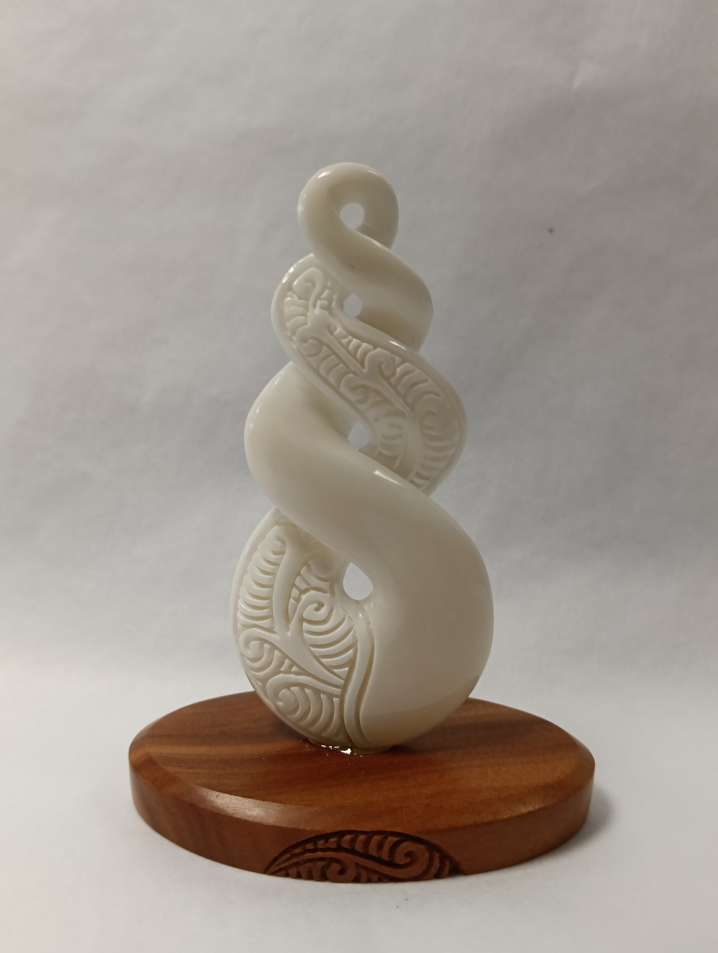 Bone Triple Twist On Wood Base