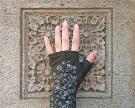 Green Korokio merino fingerless gloves